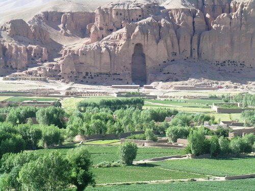 Destroyed Bamiyan statues with caves at the foot of the cliffs Destroyed Bamiyan statues with caves at the foot of the cliffs