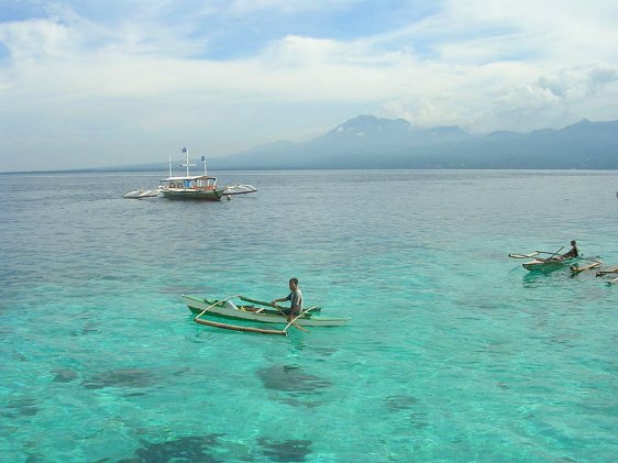 Fishermen off Negros, in the background Fishermen off Negros, in the background