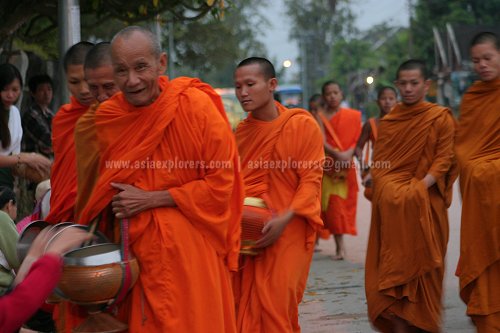 Laotian monks receiving alms