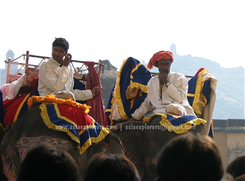 Mahouts on their elephants at Amber Fort