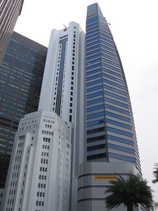 Maybank Tower, located to the right of the Bank of China Building Maybank Tower, located to the right of the Bank of China Building