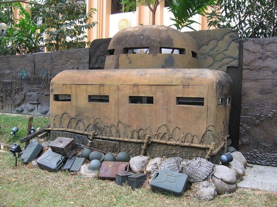 The bronze mural and pillbox memorial The bronze mural and pillbox memorial