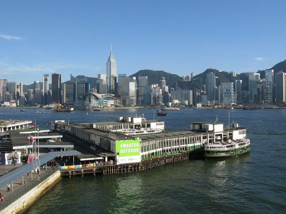 Tsim Sha Tsui Ferry Pier with Hong Kong Island in the background Tsim Sha Tsui Ferry Pier with Hong Kong Island in the background